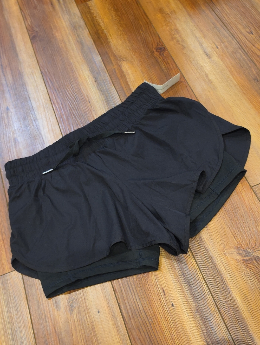 NWOT Women's Black Athletic Shorts with biker shorts liner
